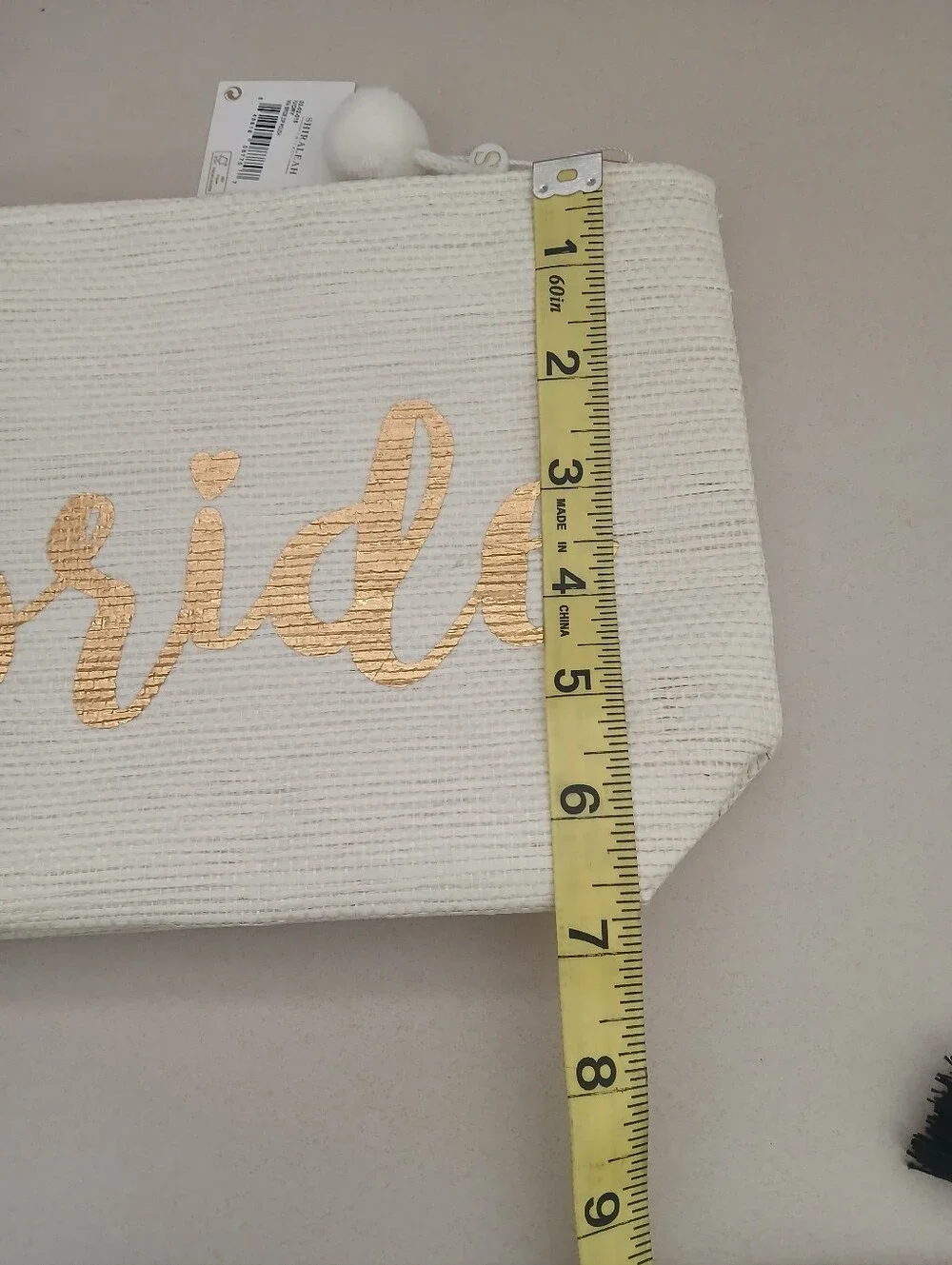 Shiraleah Cream Canvas Pouch with Gold Script and Pom Pom
